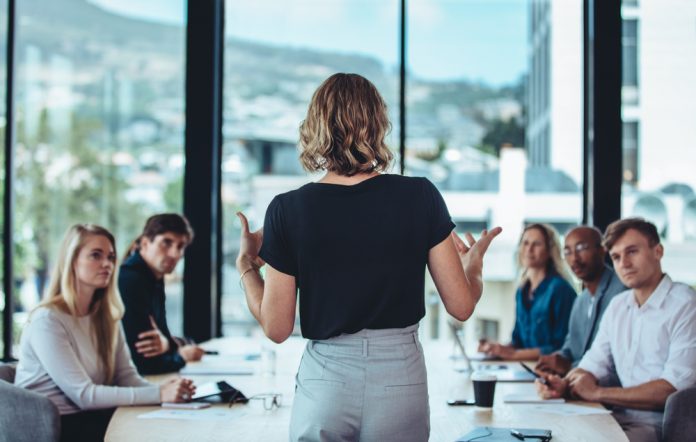 A woman leading a team - Training Magazine