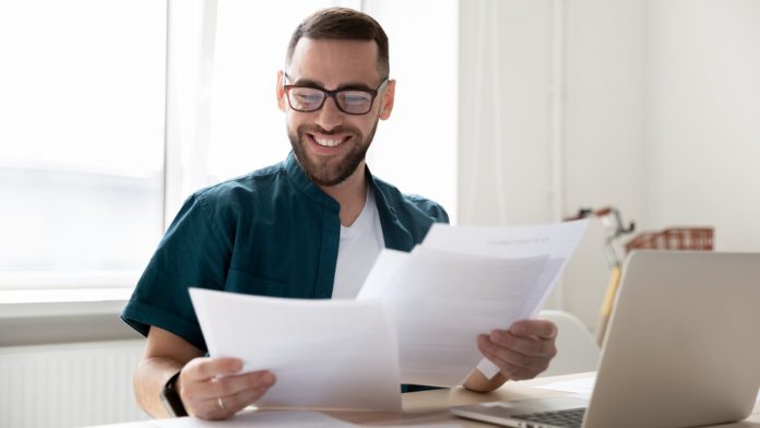 man reading an application