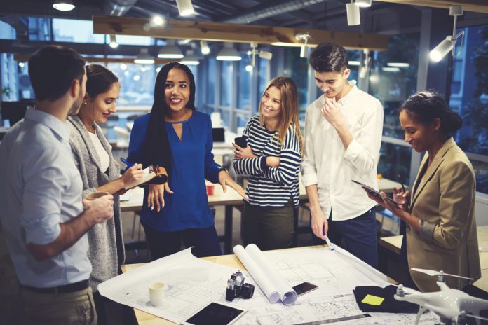 Diverse group of people working together.