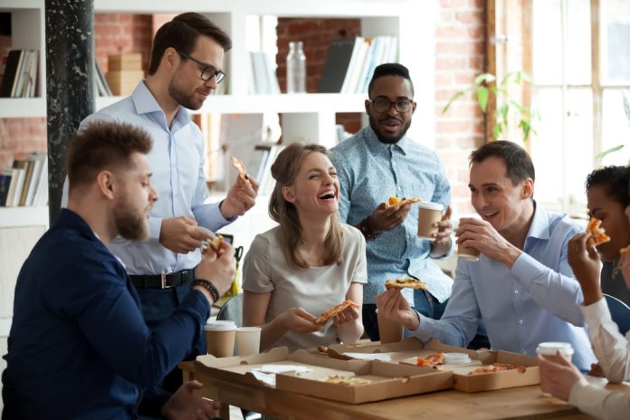 happy diverse team laughing together.