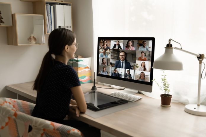 Back,Rear,View,Happy,Millennial,Female,Employee,Looking,At,Computer