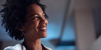 Portrait,Of,Smiling,Black,Female,Doctor.