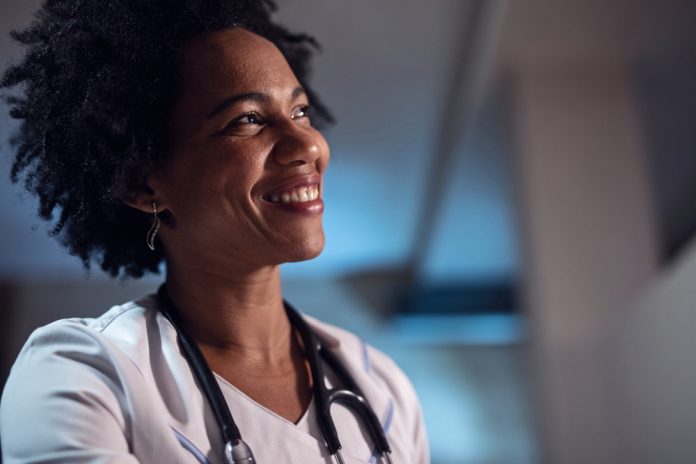 Portrait,Of,Smiling,Black,Female,Doctor.