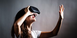 Young,Woman,Using,A,Virtual,Reality,Headset