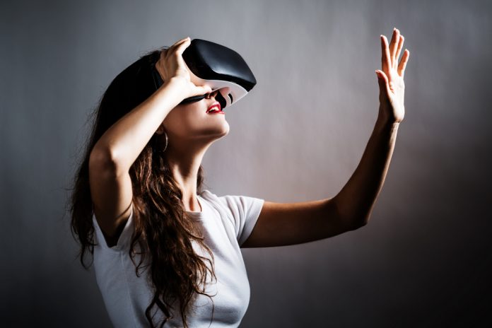 Young,Woman,Using,A,Virtual,Reality,Headset