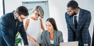 A group of workers collaborating on a project