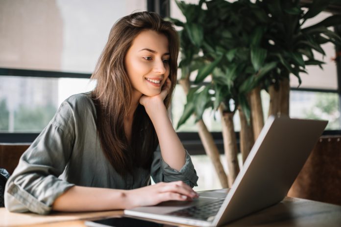 Successful,Freelancer,Typing,On,Keyboard,Using,Laptop,Computer,In,Loft