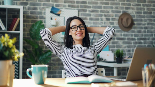 Building a more inviting workpalce Woman sitting back in a desk chair