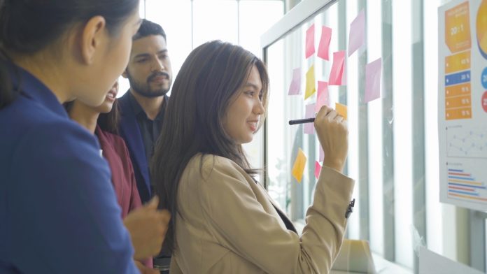 A,Group,Of,Asian,Business,Team,Talk,,Communicate,,Discuss,,And
