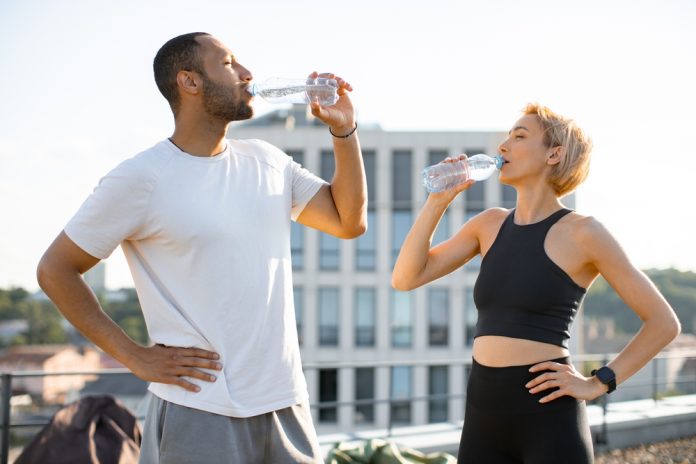 Young,Athletic,Family,Engaged,In,Healthy,Lifestyle,During,Morning,Warm-up