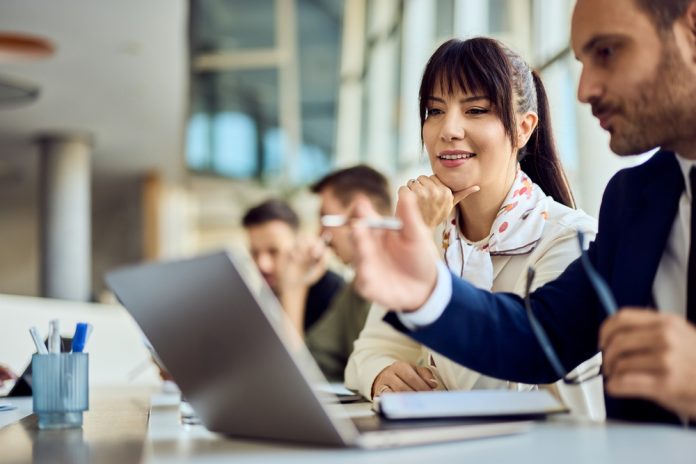 Colleagues,Discussing,A,Project,During,A,Business,Meeting,In,A