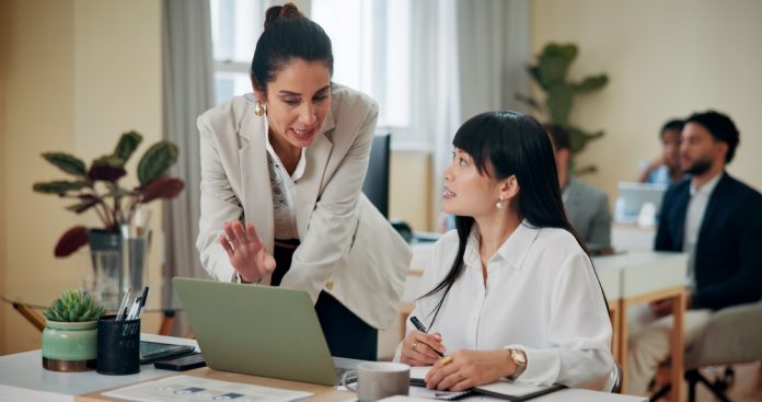 Business,Women,,Laptop,And,Discussion,In,Office,For,Advice,,Training