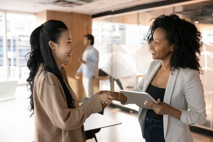 African,Executive,Manager,Or,Consultant,Greeting,Asian,Client,,Start,Negotiation,