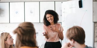 Beautiful,African,American,Lady,With,Dark,Curly,Hair,Happily,Speaking