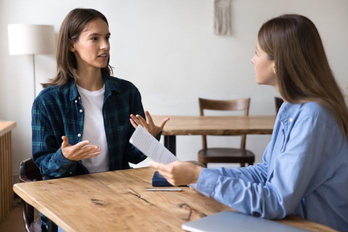 Young,Female,Candidate,Engaged,In,Conversation,,Using,Hand,Gestures,Feel