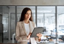 a woman working on a computer.