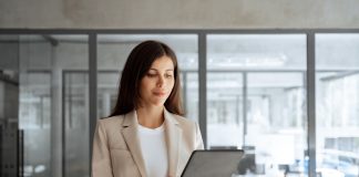 a woman working on a computer.