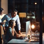 Business,People,,Team,And,Night,With,Computer,For,Deadline,,Project