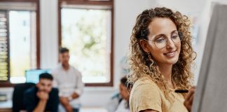 Coaching,,Meeting,And,Presentation,With,Designer,Woman,In,Creative,Workplace