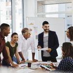 Collaborative Workforce Training: The Key to Building an Inclusive Green Economy Teamwork,,Creative,Group,And,Business,Discussion,In,Office,,Documents,And