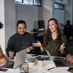 Business,People,,Meeting,And,Discussion,With,Tech,In,Office,For