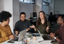 Business,People,,Meeting,And,Discussion,With,Tech,In,Office,For