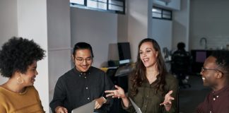 Business,People,,Meeting,And,Discussion,With,Tech,In,Office,For