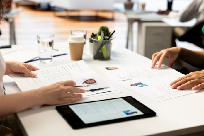 Talent,Acquisition,Experts,Looking,At,Cvs,On,Tablet,To,Vet