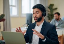 Sales vs. Service: Why Your Customer Doesn’t Care About Your Org Chart Businessman,,Talking,And,Headset,With,Laptop,In,Office,,Consultant,And