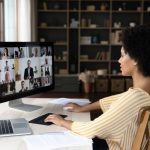 Side,View,Concentrated,Millennial,African,American,Business,Woman,Holding,Video