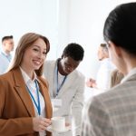 Group,Of,People,Chatting,During,Coffee,Break,Indoors