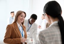 Group,Of,People,Chatting,During,Coffee,Break,Indoors