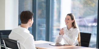 Hr,Manager,Having,An,Interview,With,A,Male,Candidate,In