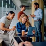 Business,People,Enjoying,Coffee,,Smiling,,And,Using,Digital,Tablet,During