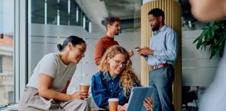Business,People,Enjoying,Coffee,,Smiling,,And,Using,Digital,Tablet,During