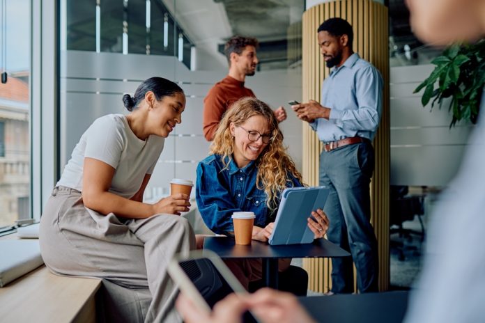 Business,People,Enjoying,Coffee,,Smiling,,And,Using,Digital,Tablet,During Business,People,Enjoying,Coffee,,Smiling,,And,Using,Digital,Tablet,During