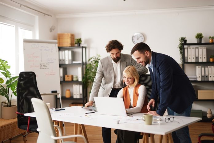 A,Group,Of,Three,Team,Members,Collaborates,In,An,Office Explore twelve positive and constructive leadership activities that enhance relationships and foster innovative business operations.