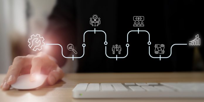 Business,Improvement,And,Solution,Strategy.,Using,Computer,With,Floating,Icons